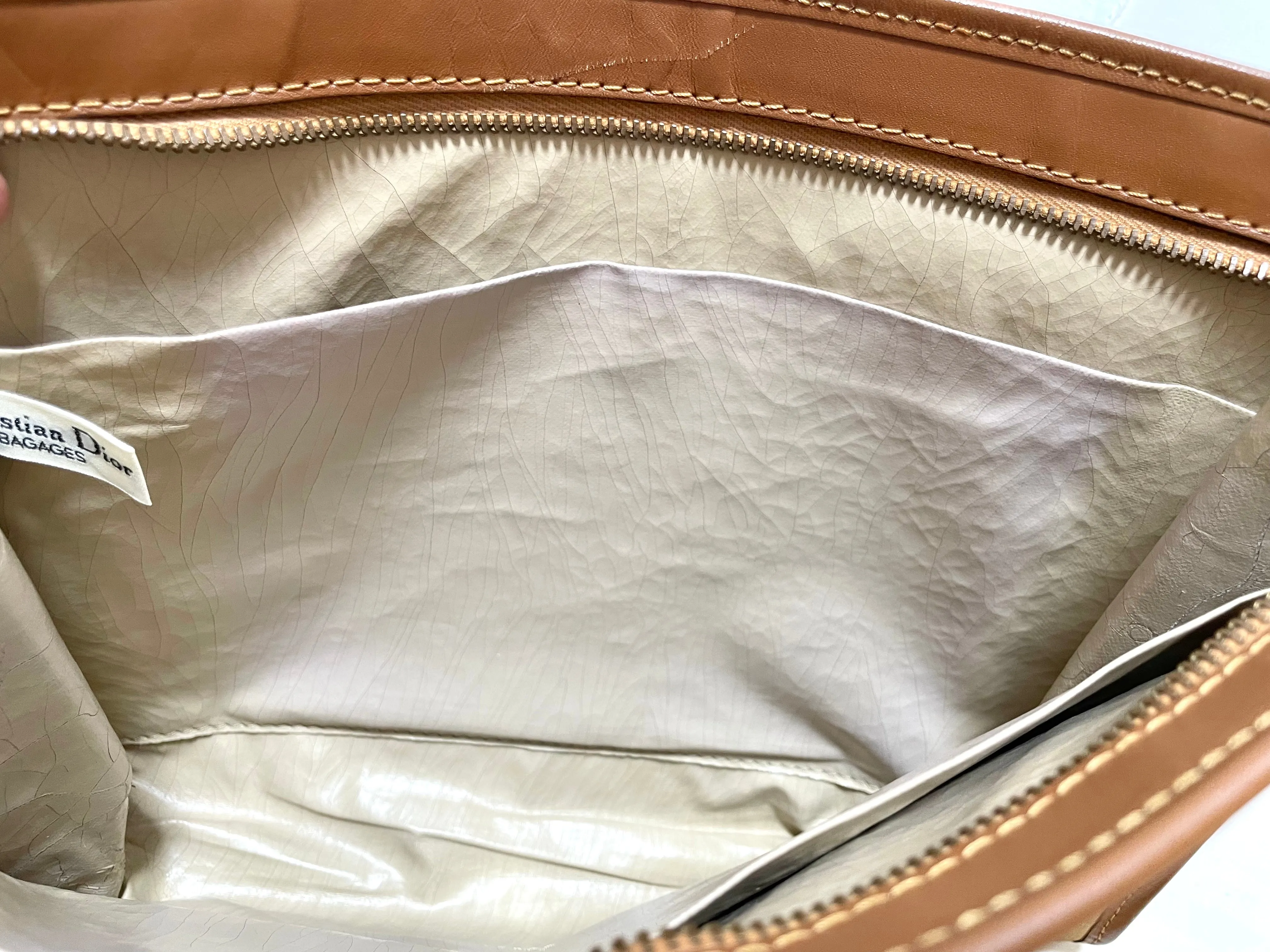 Vintage Christian Dior Bagages camel brown suede leather clutch purse, pouch with embossed Dior logo allover. Unisex use. 0505081