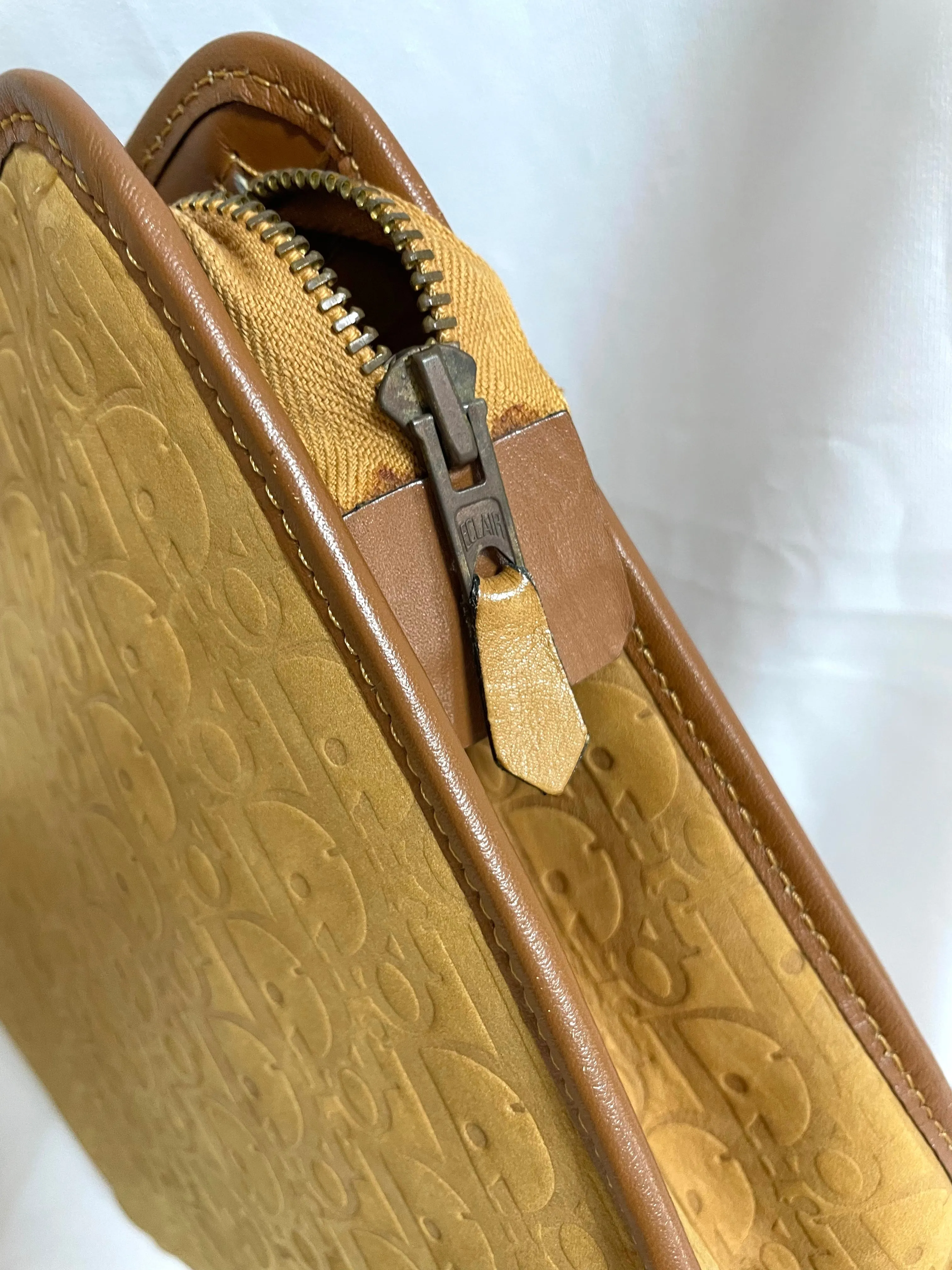 Vintage Christian Dior Bagages camel brown suede leather clutch purse, pouch with embossed Dior logo allover. Unisex use. 0505081