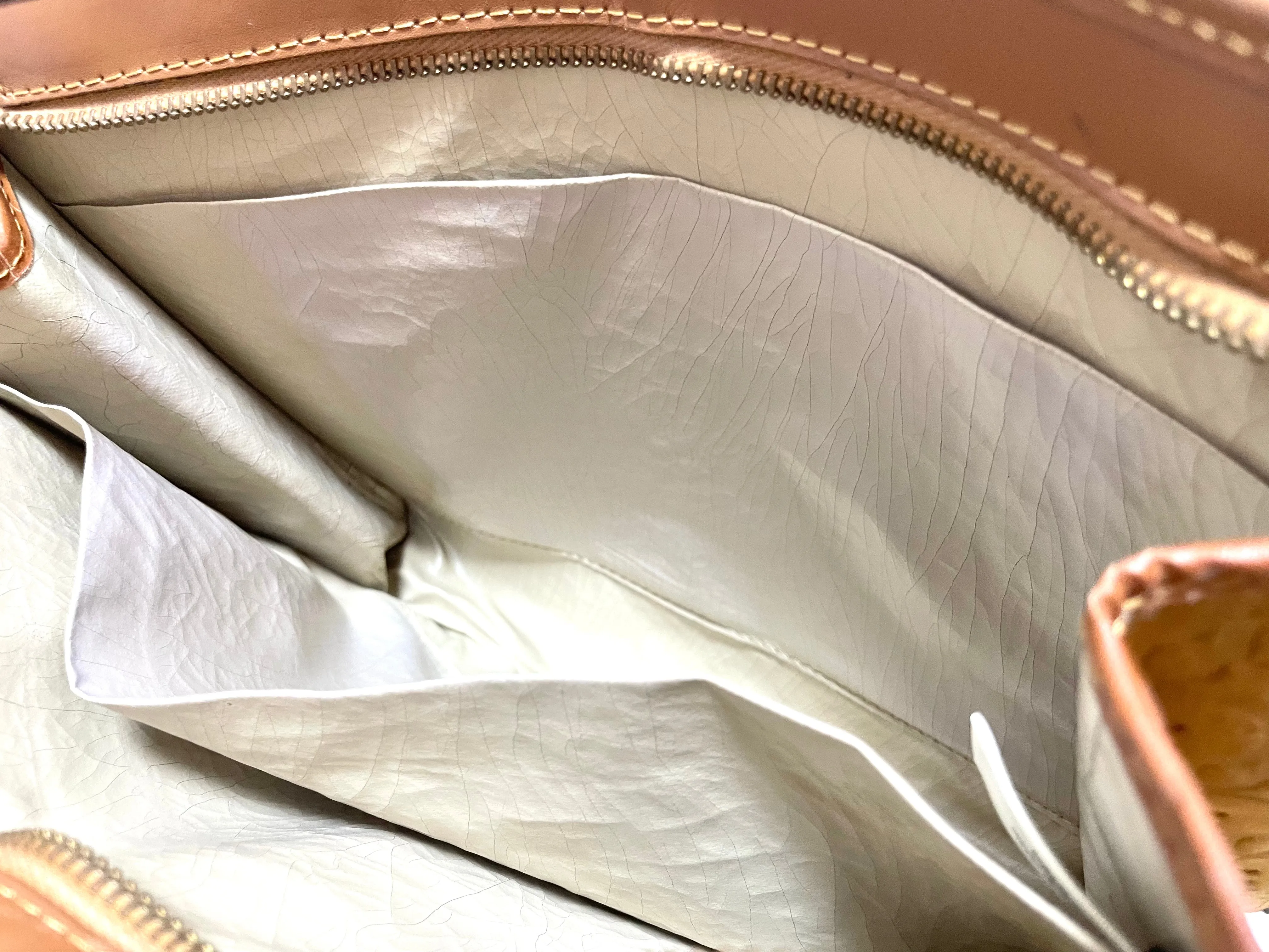 Vintage Christian Dior Bagages camel brown suede leather clutch purse, pouch with embossed Dior logo allover. Unisex use. 0505081